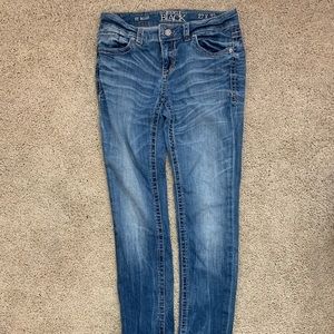 Buckle Black Skinny Jeans Sz 27x32